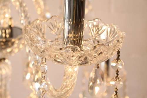 A spectacular three-tier crystal chandelier with curved glass arms and 21x light fittings = WOW!!