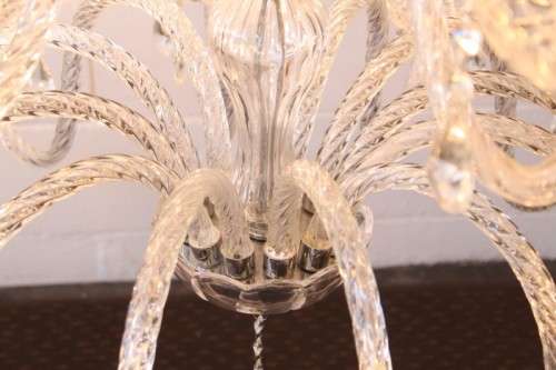 A spectacular three-tier crystal chandelier with curved glass arms and 21x light fittings = WOW!!