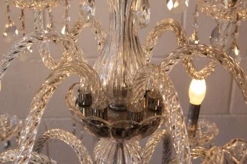 A spectacular three-tier crystal chandelier with curved glass arms and 21x light fittings = WOW!!