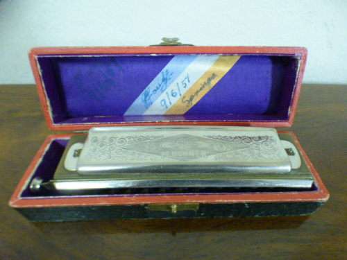 A wonderful vintage (1957) German made M Hohner Super Chromonica harmonica in its original box.