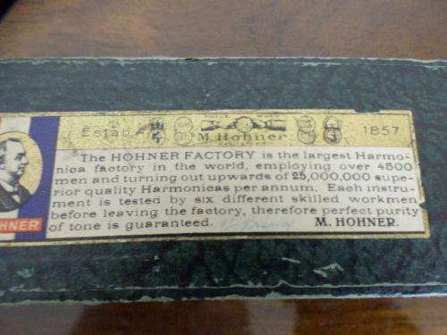 A wonderful vintage (1957) German made M Hohner Super Chromonica harmonica in its original box.