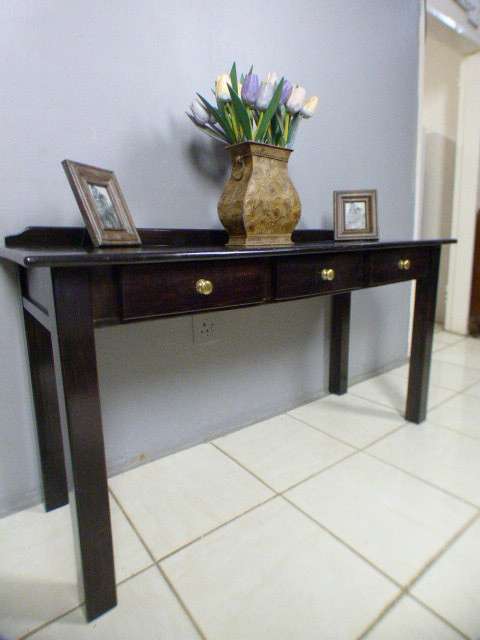 Spectacular wood buffet console/hall table with three spacious drawers in remarkable condition