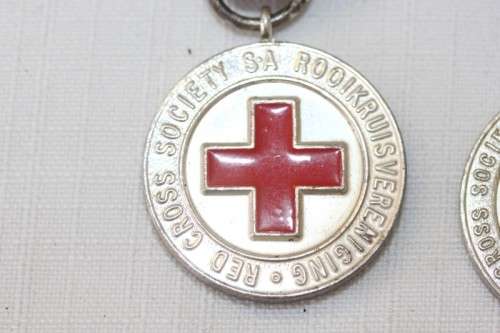 Three amazing "The South African Red Cross Society" ribboned medal - proficiency medallion.