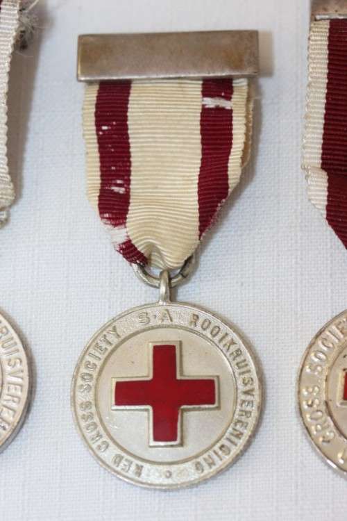 Three amazing "The South African Red Cross Society" ribboned medal - proficiency medallion.