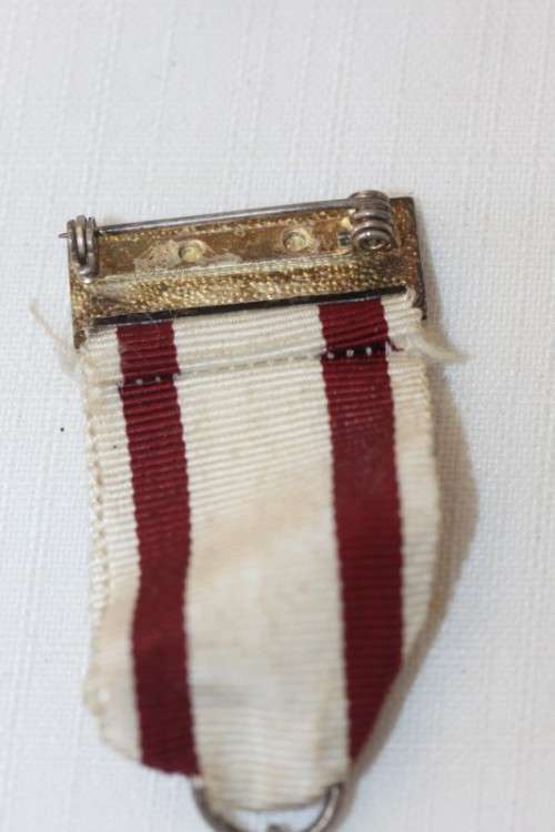 Three amazing "The South African Red Cross Society" ribboned medal - proficiency medallion.