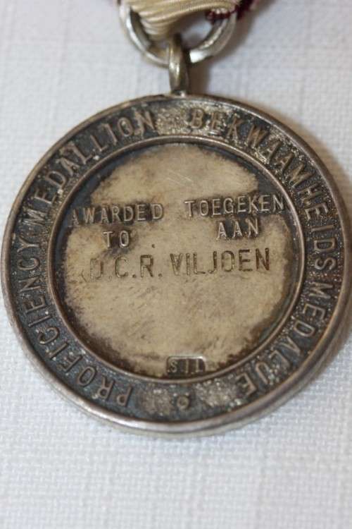 Three amazing "The South African Red Cross Society" ribboned medal - proficiency medallion.