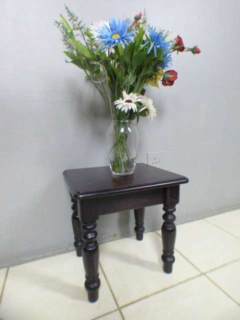 A gorgeous, heavy dark wood occasional/ display/ side table, perfect in your living rooms!!