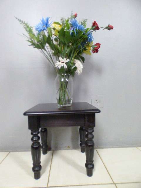 A gorgeous, heavy dark wood occasional/ display/ side table, perfect in your living rooms!!