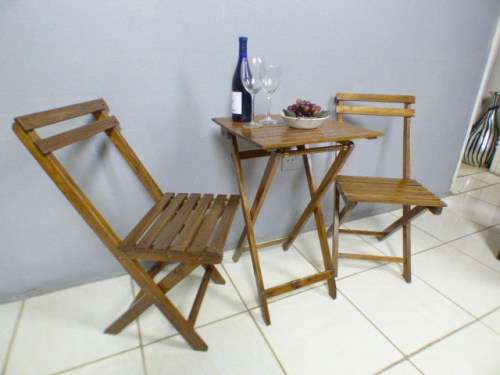 A top quality two seater wooden, all weather fold away outdoor patio/picnic set. Superb quality!!!