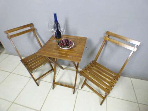 A top quality two seater wooden, all weather fold away outdoor patio/picnic set. Superb quality!!!