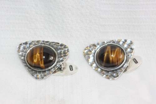 An awesome pair of silver gents chain link cuff-links with round tigers-eye stones