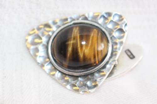 An awesome pair of silver gents chain link cuff-links with round tigers-eye stones