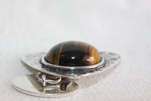 An awesome pair of silver gents chain link cuff-links with round tigers-eye stones