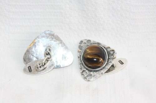 An awesome pair of silver gents chain link cuff-links with round tigers-eye stones