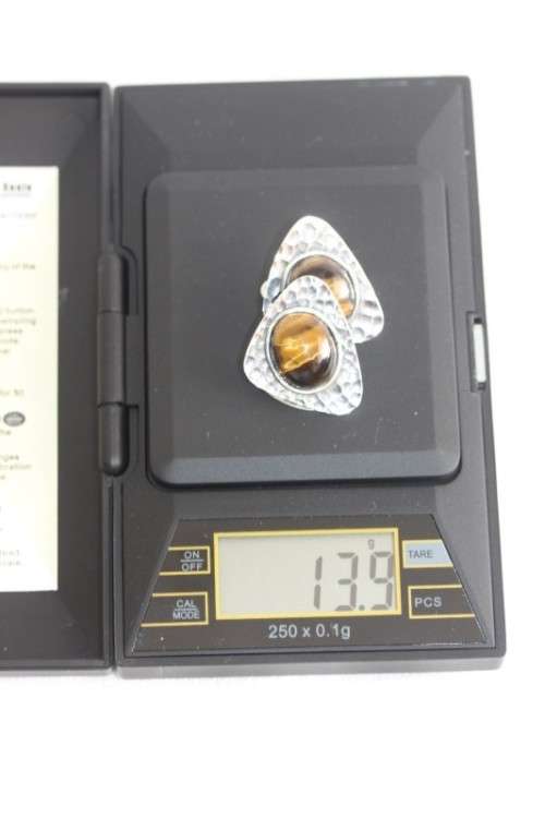 An awesome pair of silver gents chain link cuff-links with round tigers-eye stones