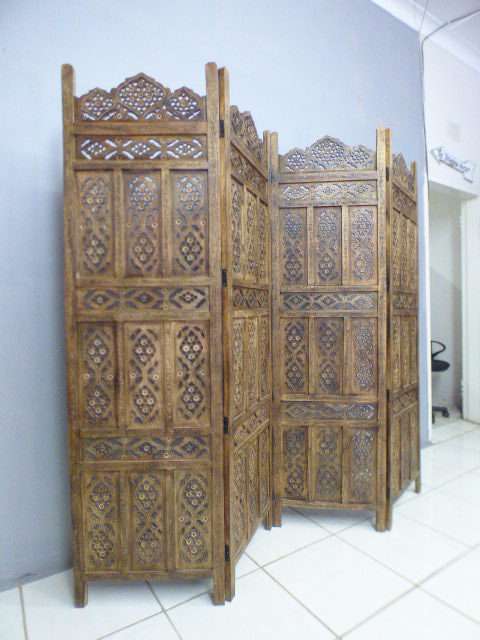 A magnificent antique solid teak 4-panel room divider w/ exquisite hand carved detailing! Gorgeous!