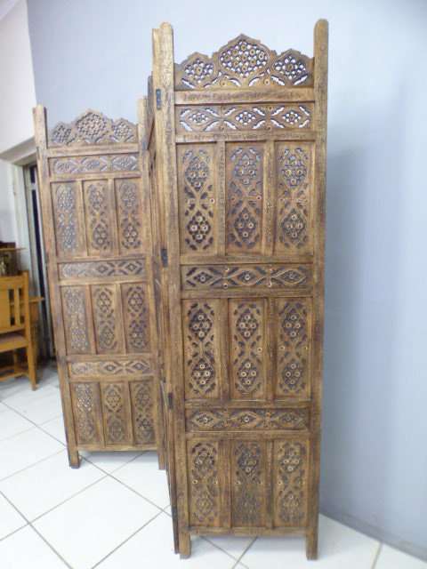 A magnificent antique solid teak 4-panel room divider w/ exquisite hand carved detailing! Gorgeous!