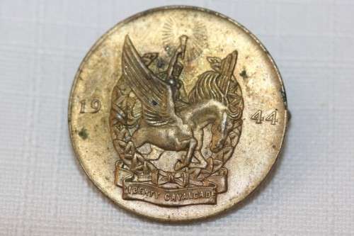 A wonderful RSA (1944) WWII "Liberty Cavalcade" lapel badge