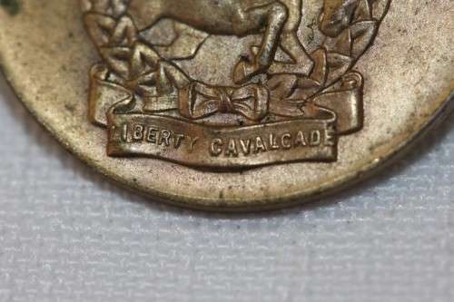 A wonderful RSA (1944) WWII "Liberty Cavalcade" lapel badge
