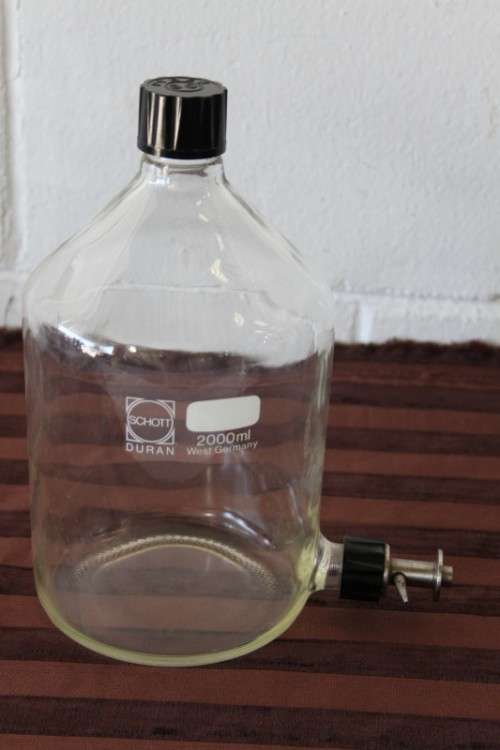 A vintage Duran 2000ml laboratory bottle made for maximum chemical and thermal shock resistance