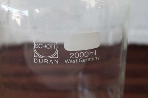 A vintage Duran 2000ml laboratory bottle made for maximum chemical and thermal shock resistance