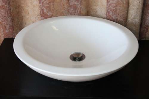 Two stunning ebony stained wooden vanity stands with basins and ample packing space - bid/stand