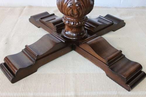 A very well made and heavy oak dining table w/ a wonderfully carved centre leg