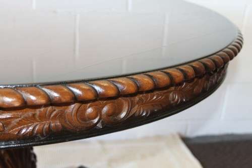 A very well made and heavy oak dining table w/ a wonderfully carved centre leg