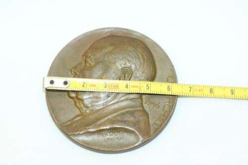 An original 1945 Winston Churchill bronze Victory Medal commemorating the end of World War II