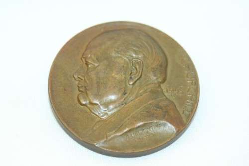 An original 1945 Winston Churchill bronze Victory Medal commemorating the end of World War II