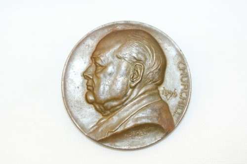 An original 1945 Winston Churchill bronze Victory Medal commemorating the end of World War II