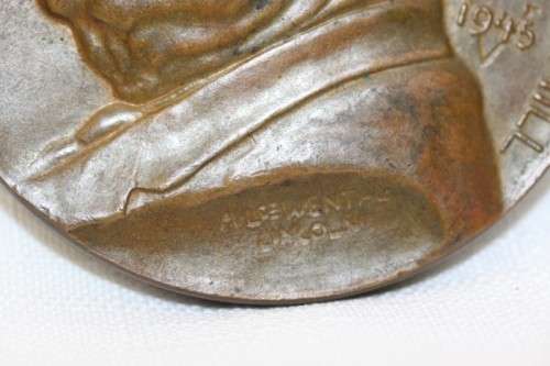 An original 1945 Winston Churchill bronze Victory Medal commemorating the end of World War II