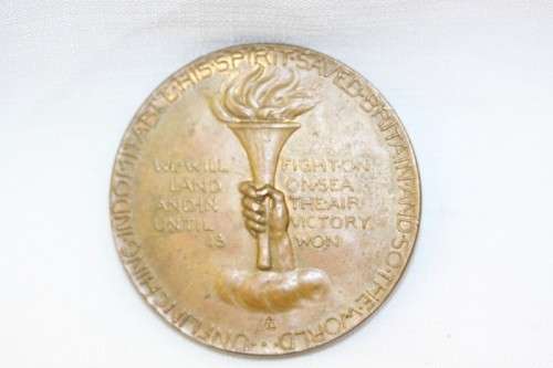 An original 1945 Winston Churchill bronze Victory Medal commemorating the end of World War II