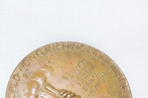 An original 1945 Winston Churchill bronze Victory Medal commemorating the end of World War II