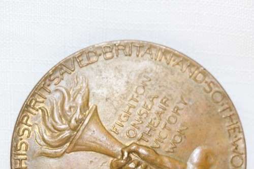 An original 1945 Winston Churchill bronze Victory Medal commemorating the end of World War II