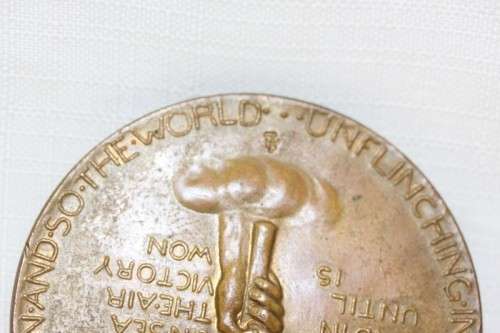 An original 1945 Winston Churchill bronze Victory Medal commemorating the end of World War II