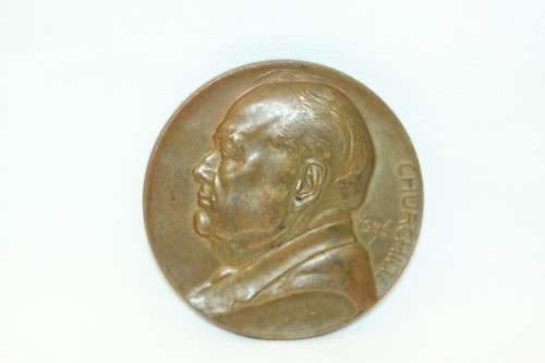 An original 1945 Winston Churchill bronze Victory Medal commemorating the end of World War II