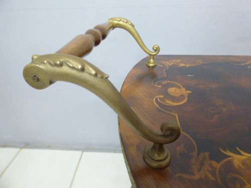 An exquisite Italian Sorrento style wood antique drinks trolley on original castors and wheels.