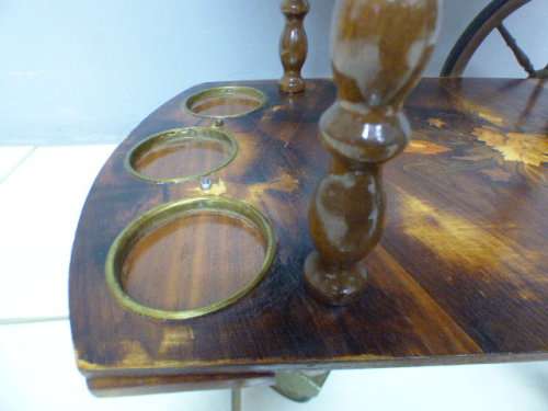 An exquisite Italian Sorrento style wood antique drinks trolley on original castors and wheels.