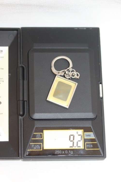 A stunning vintage solid silver photo frame key holder/ chain in fantastic condition