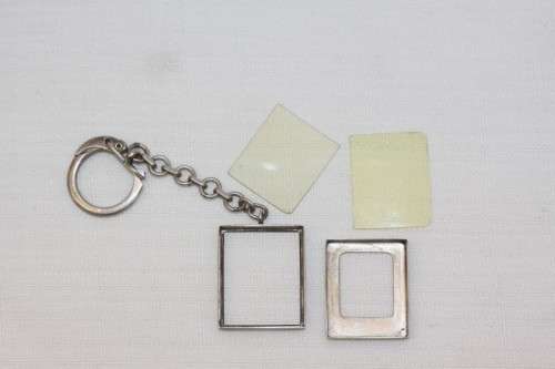 A stunning vintage solid silver photo frame key holder/ chain in fantastic condition