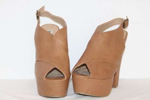 A beautiful pair of Steve Madden "Gabby"chunky-heel slingback platform shoes in Cognac colour