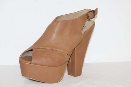 A beautiful pair of Steve Madden "Gabby"chunky-heel slingback platform shoes in Cognac colour