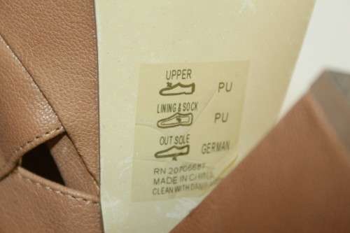 A beautiful pair of Steve Madden "Gabby"chunky-heel slingback platform shoes in Cognac colour