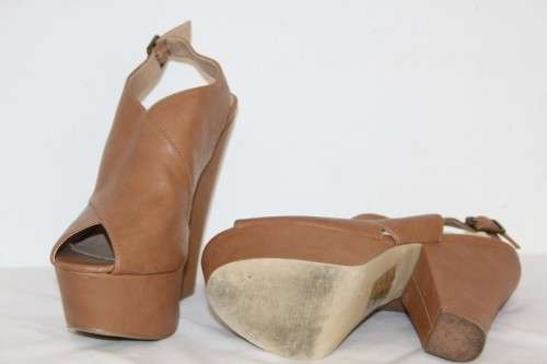 A beautiful pair of Steve Madden "Gabby"chunky-heel slingback platform shoes in Cognac colour