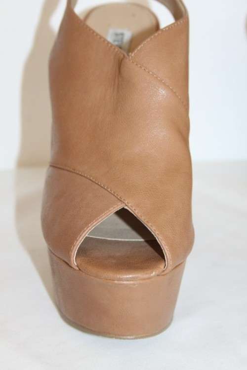 A beautiful pair of Steve Madden "Gabby"chunky-heel slingback platform shoes in Cognac colour