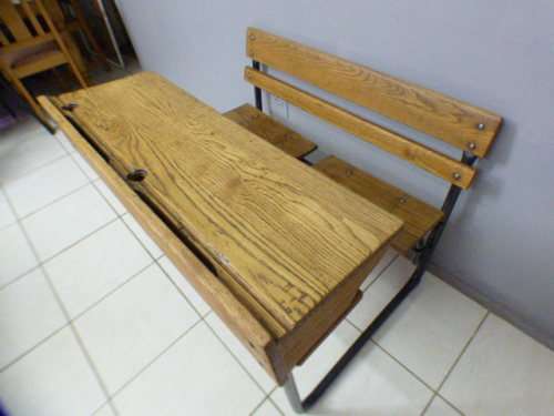 An awesome vintage/ antique? solid teak two seater school desk in wonderful condition.