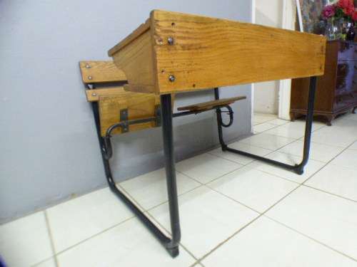 An awesome vintage/ antique? solid teak two seater school desk in wonderful condition.
