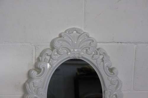 A stunning white ornately moulded oval wall mirror in awesome condition; Perfect to paint technique