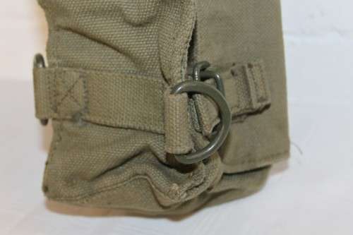 A vintage olive green military water bottle carry bag in very good condition